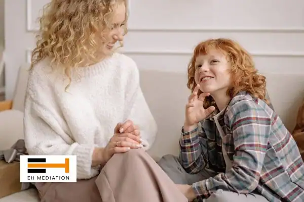 Happy mother and child after sorting child arrangements mediation Oldham